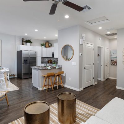 Hillstone_HillstoneResidencesatCanyonTrails_Plan4GreatRoom1-web-1024x683